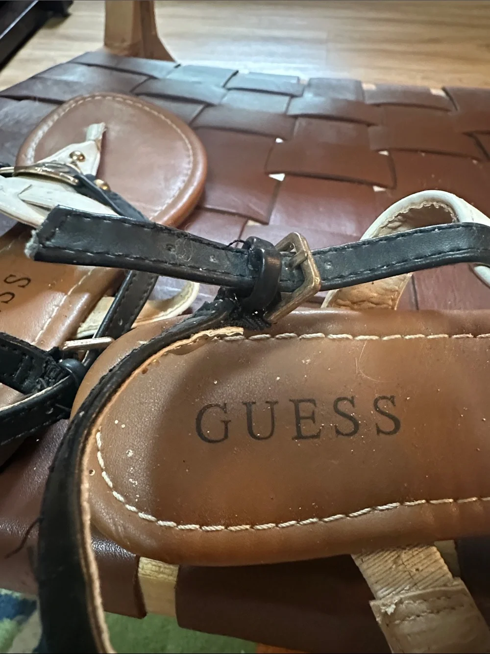 Guess White and Black Leather T-Strap Sandals with Gold Logo